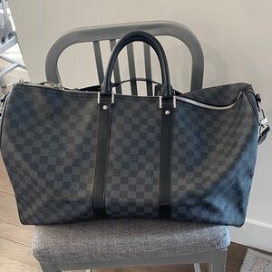 Checkered Black Travel Bag